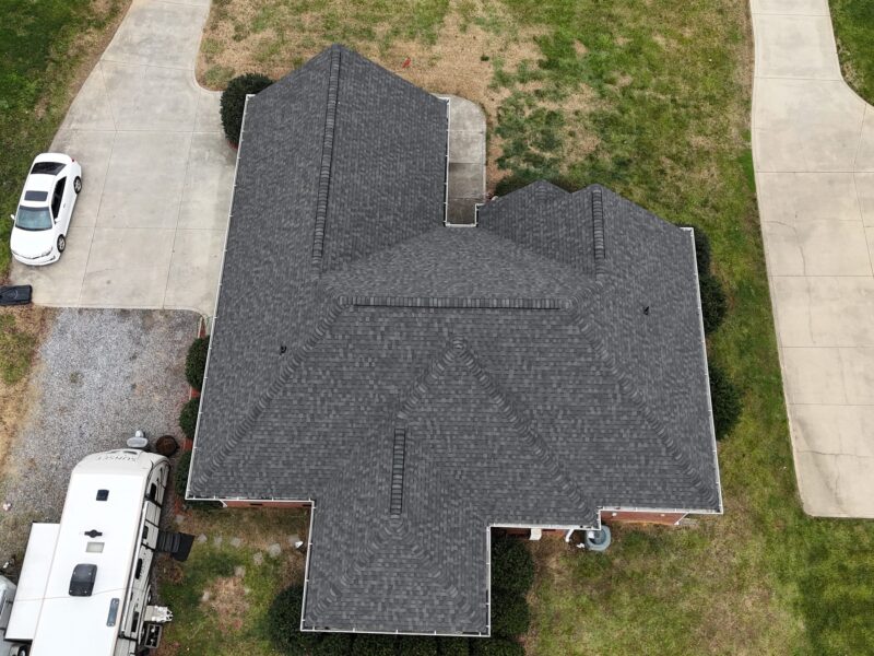 Asphalt shingle roof in bright summer sun on a North Carolina home