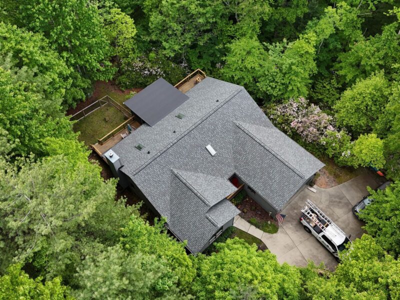 Newly installed gray shingle roof on a North Carolina home