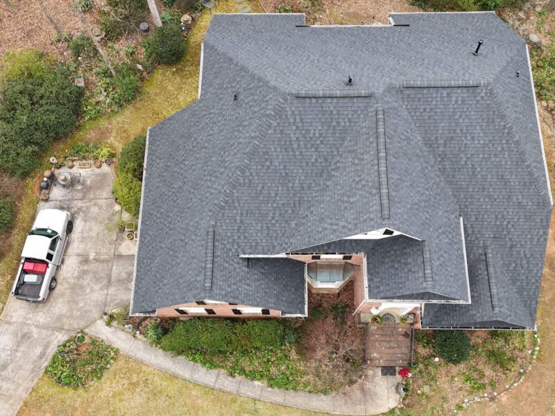 Documentation-style aerial photo of a residential roof inspection in North Carolina